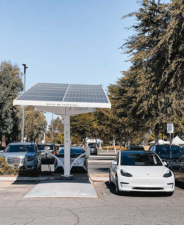 Solar-integrated EV charging station with Tesla electric vehicle in California